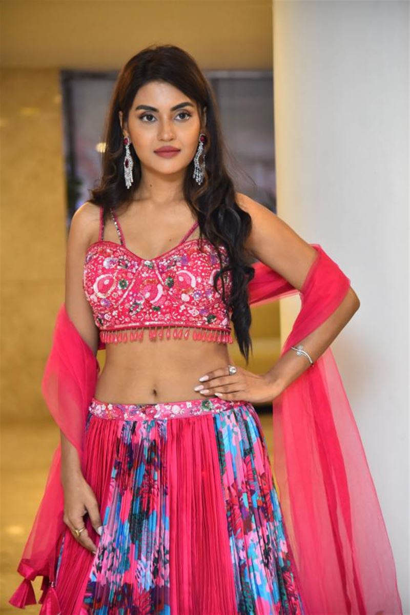 Telugu Girl Garima Chouhan Stills In Red Lehenga Choli